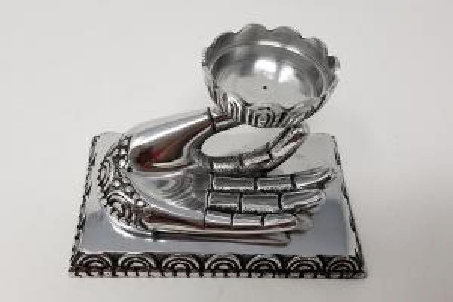 Hand of Compassion Metal Burner